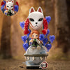 Collectible blind box figures featuring a white cat-like character and an orange-haired female character from Demon Slayer