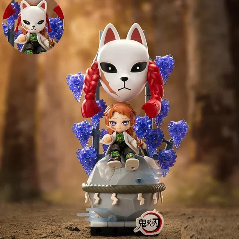 Collectible blind box figures featuring a white cat-like character and an orange-haired female character from Demon Slayer