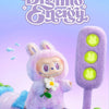 A purple plush pendant of a monster character is shown against a light purple background.
