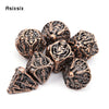 A set of coppery skull metal polyhedral dice used for tabletop role-playing games