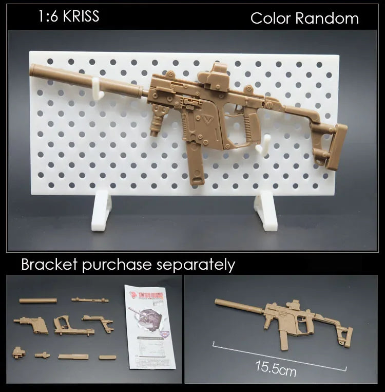 A 1:6 Kriss submachine gun model kit displayed on a white pegboard with separate bracket components.