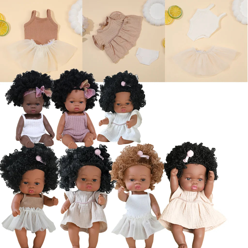 A set of three outfits for a 14-inch baby doll, including a beige top, a pink romper, and a white dress.