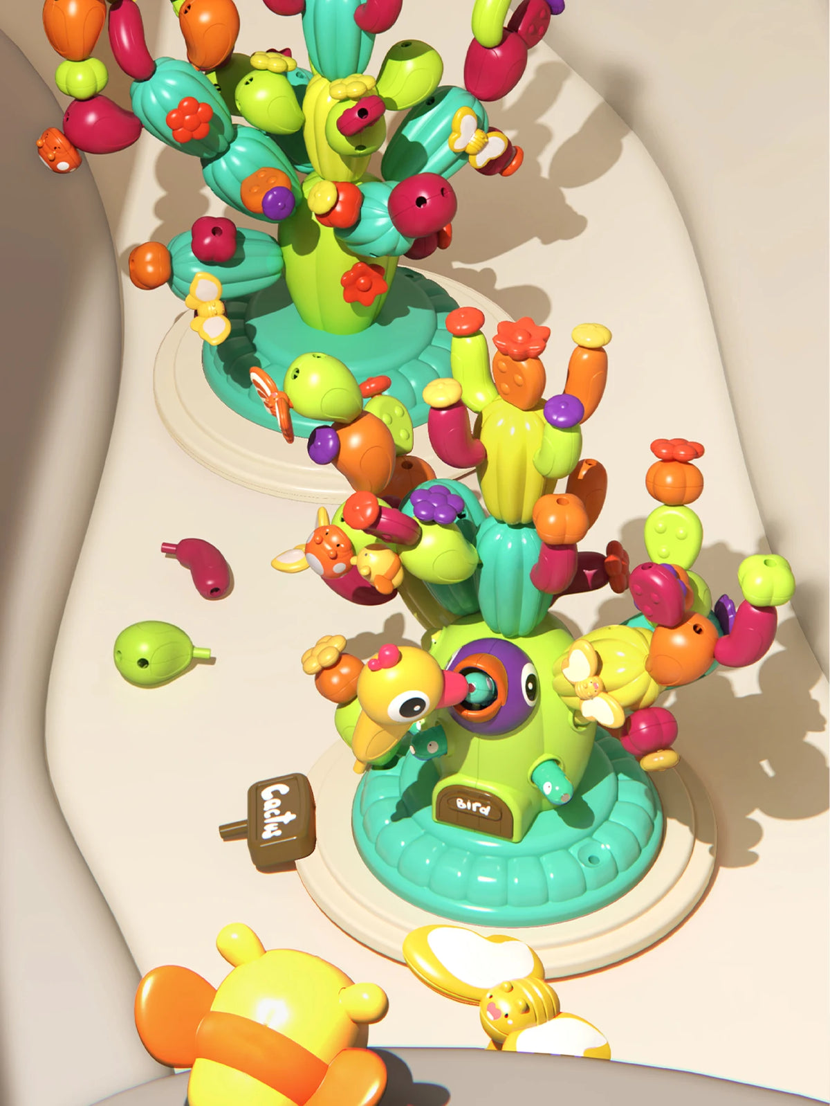A colorful set of cactus building blocks featuring various fruits and vegetables in bright green, yellow, orange, and pink.