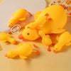 A collection of bright yellow squishy duck toys for stress relief and sensory play