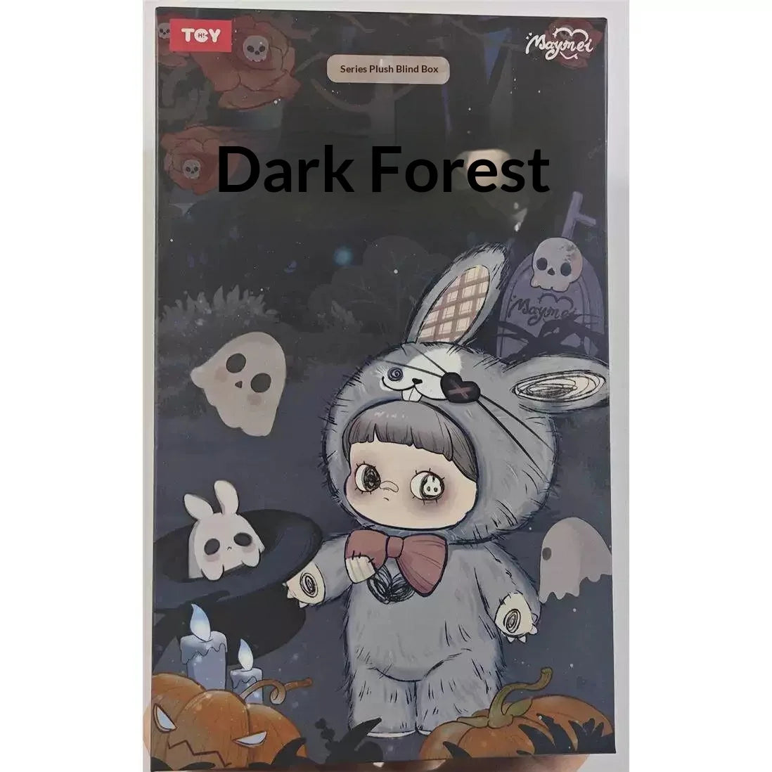 A plush doll featuring a cute, pale gray rabbit character with white accents and small skulls, displayed on a dark background