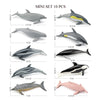 A mini set of 10 realistic ocean animal figurines including a whale, shark, dolphin, turtle, and penguin.