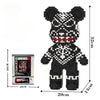 A black and white 3D bear building kit made of micro diamond blocks for a STEM toy.