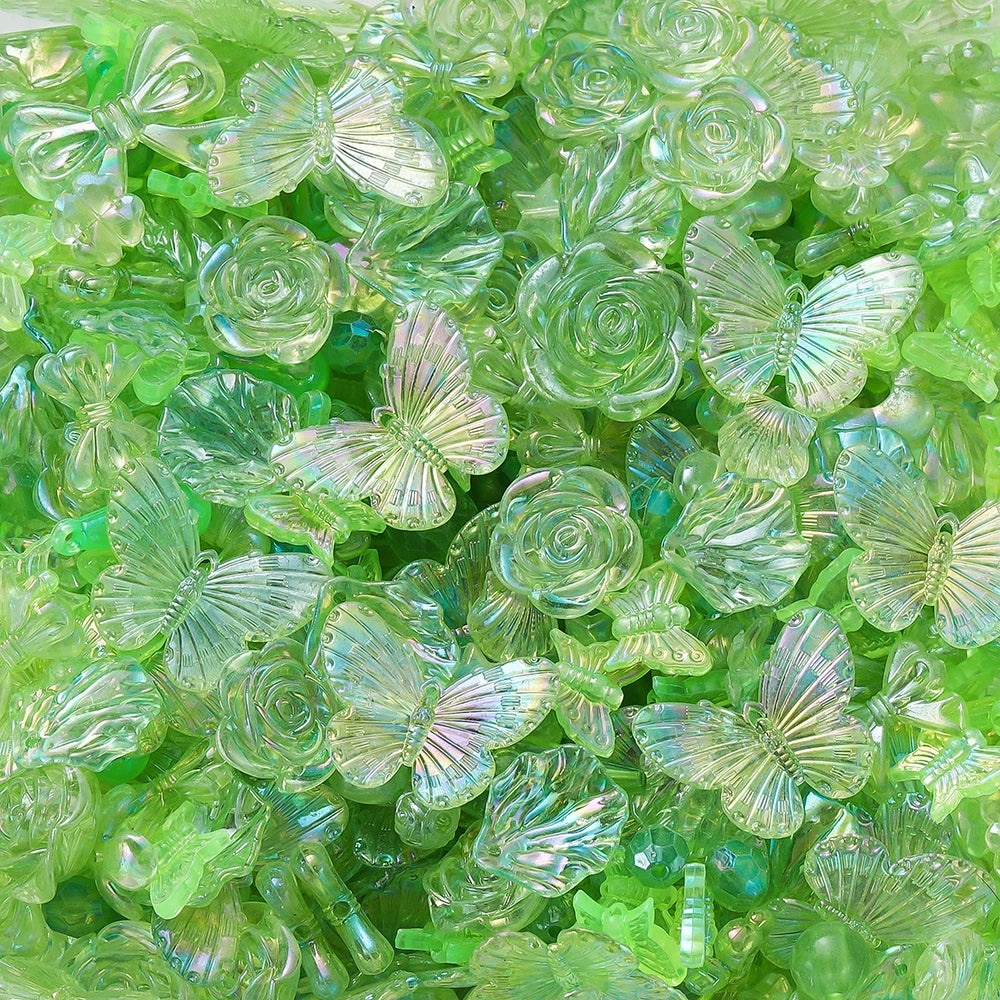 Green acrylic butterfly shells and beads used for DIY jewelry making