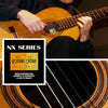 A person plays a guitar, showing the NX Series branding and silver-plated nylon classical guitar strings.