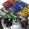 A collection of decorative motorcycle screw cap covers in various colors including red, blue, and yellow.