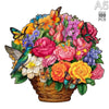 A vibrant bouquet of flowers, butterflies, and a cat puzzle set in a wooden basket.