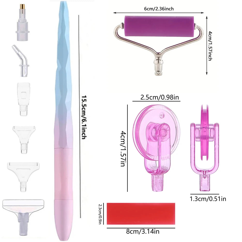 A set of diamond painting tools including a pen, roller tool, and various shaping tools in pink and clear plastic.