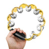 A hand holds a colorful double-layer tambourine with gold metal bells for kids.