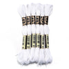 A set of six white embroidery threads for cross stitch and DIY crafts, packaged in individual spools.