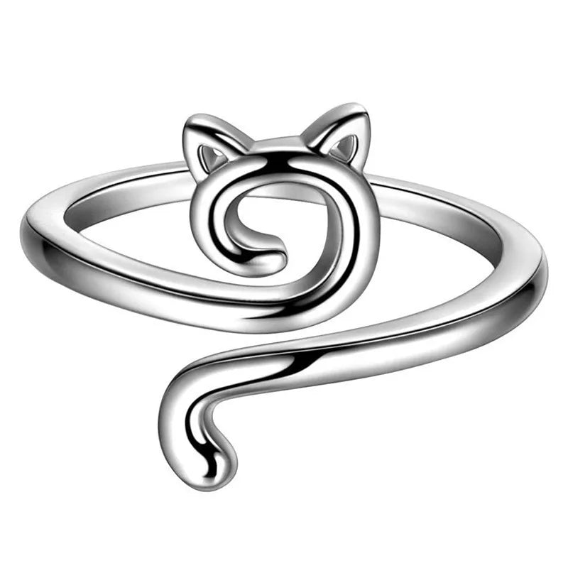 Silver adjustable cat-ear crochet ring with a swirling design