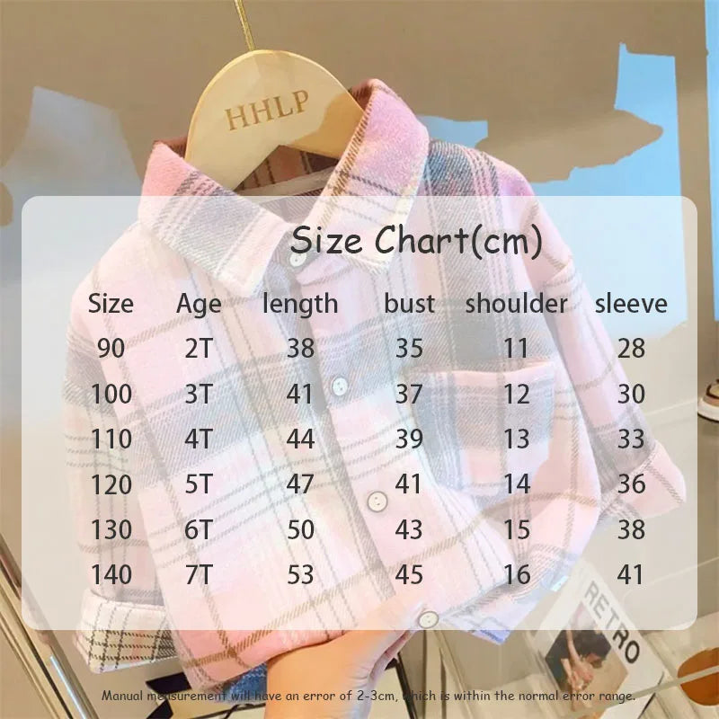 A pink and blue plaid button-up shirt displayed on a hanger with a size chart visible.