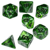 A set of seven green marble effect polyhedral dice showing various numbers and angles.