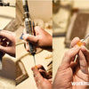 Hands are shown working with natural blue cat eye stone beads for jewelry making.