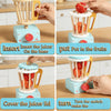 Instructions show how to insert fruits into the wooden juicer base and turn the switch to operate the kitchen play set.