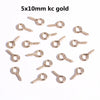 A collection of 5x10mm gold eye pins with screw threads for jewelry making.