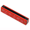 Red wooden harmonica with a black grille and pink heart decorations