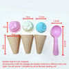 A set of pink, white, and blue sand and snow building molds including shovels and brick molds.