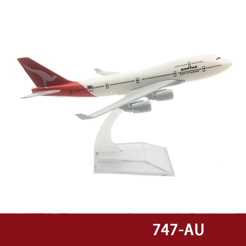Diecast model of a Qantas Boeing airplane in white and red livery.