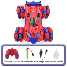 A red and blue remote control stunt car with lights and spray effect, shown next to its battery charger and water bottle.