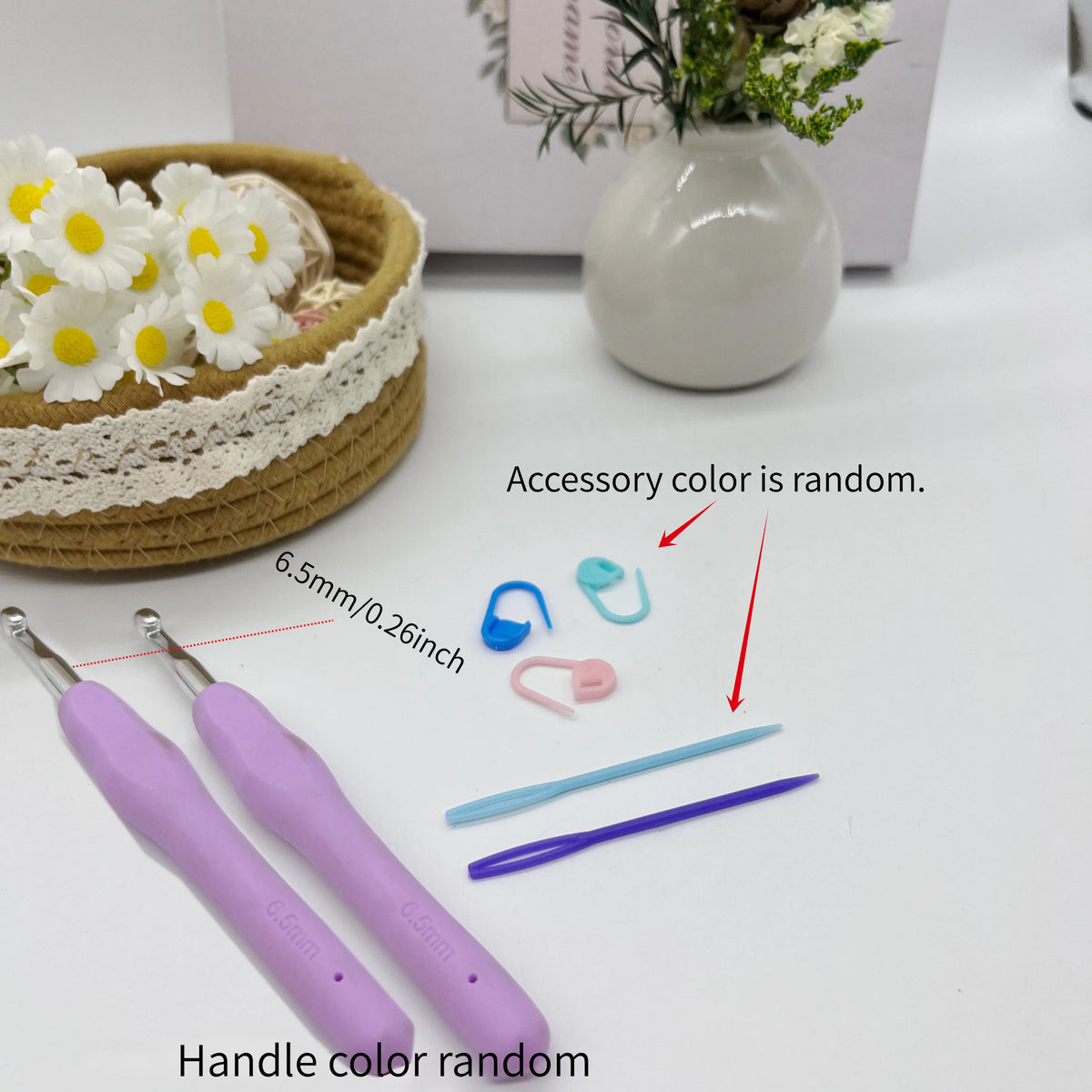 A set of crochet tools including a wooden holder, stitch markers, and various sized needles with random colors.