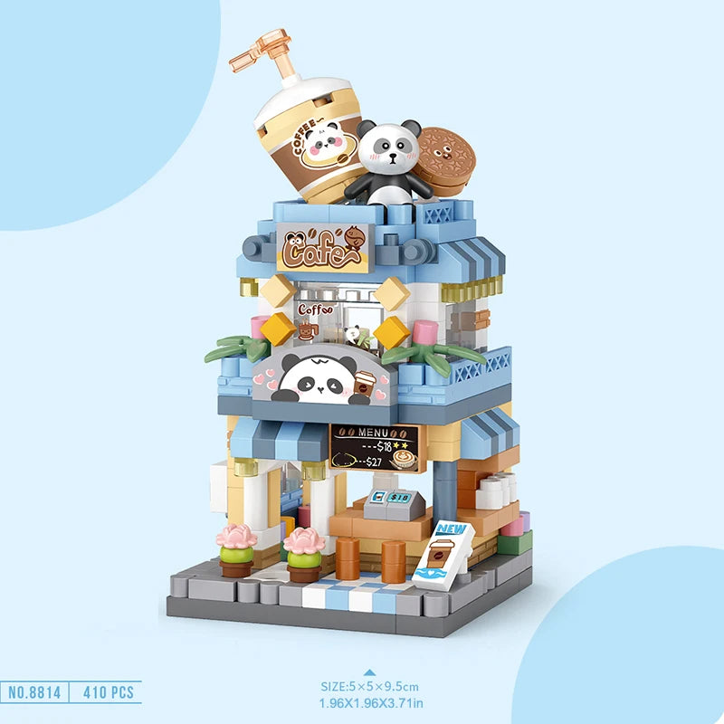 Ensemble de blocs de construction d'une ville détaillé avec une structure de café à motifs de panda et divers accessoires.