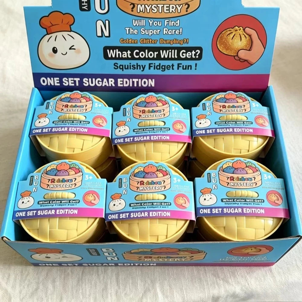 A box of squishy fidget fun items featuring golden dumplings and mystery bags.