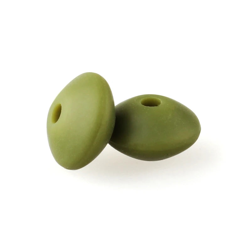 Two smooth, olive green silicone lentil beads shaped like an abacus for jewelry making