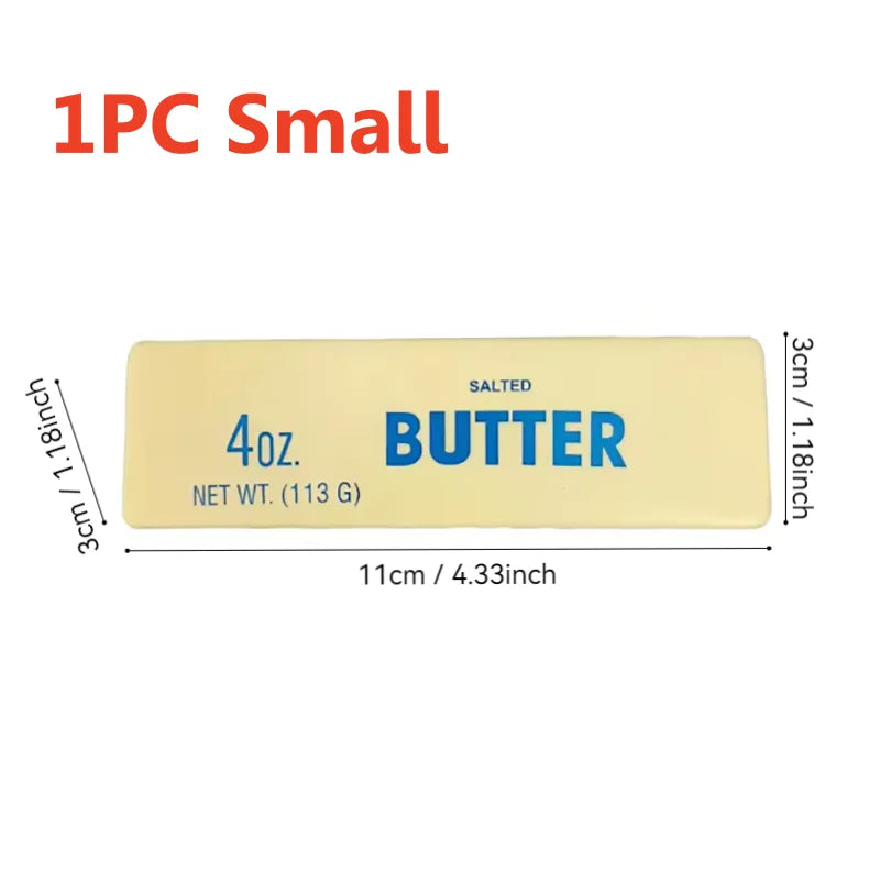 A rectangular salted butter stick, 4oz (113g), used as a squishy fidget toy.