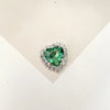 A brilliant green heart-shaped gemstone surrounded by clear rhinestones for DIY crafts.
