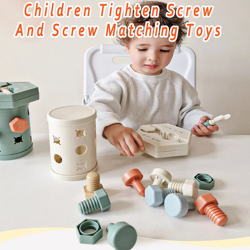 A toddler is playing with a set of wooden screws and matching toys for fine motor skills development.