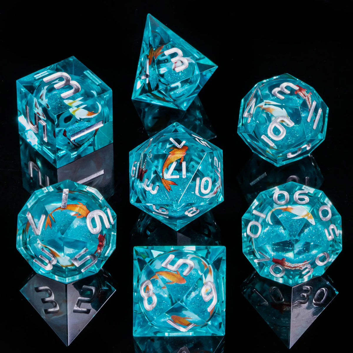 A collection of handmade liquid core resin dice in various shapes and colors, including blue and clear glass.