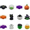 A collection of Halloween squishy stress relief toys including ghost, cat, pumpkin, and mummy characters.