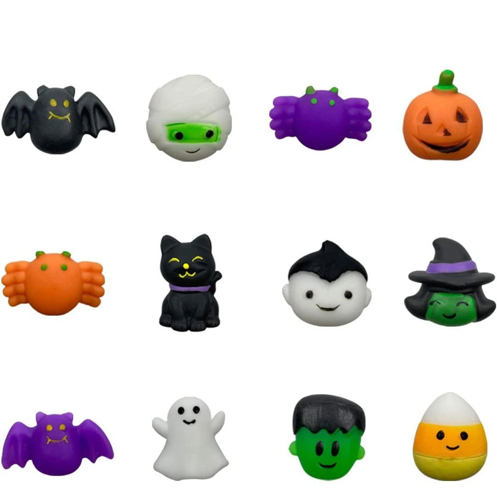 A collection of Halloween squishy stress relief toys including ghost, cat, pumpkin, and mummy characters.
