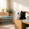 A white and black dragon plush companion featuring embroidered details sitting on a wooden surface.
