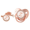 Rose gold bling baby pacifier clip with silicone holder featuring a Z design