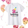 A white kids birthday number t-shirt featuring a pink striped party hat and the text 2nd birthday.