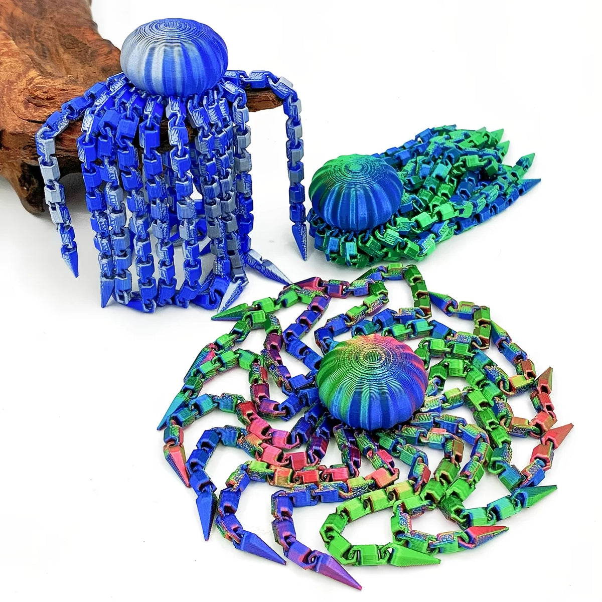 Colorful octopus desktop statue featuring blue, green, and purple tentacles and spherical heads