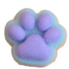 A soft, purple cat paw shaped squishy fidget toy made of mochi-like material.