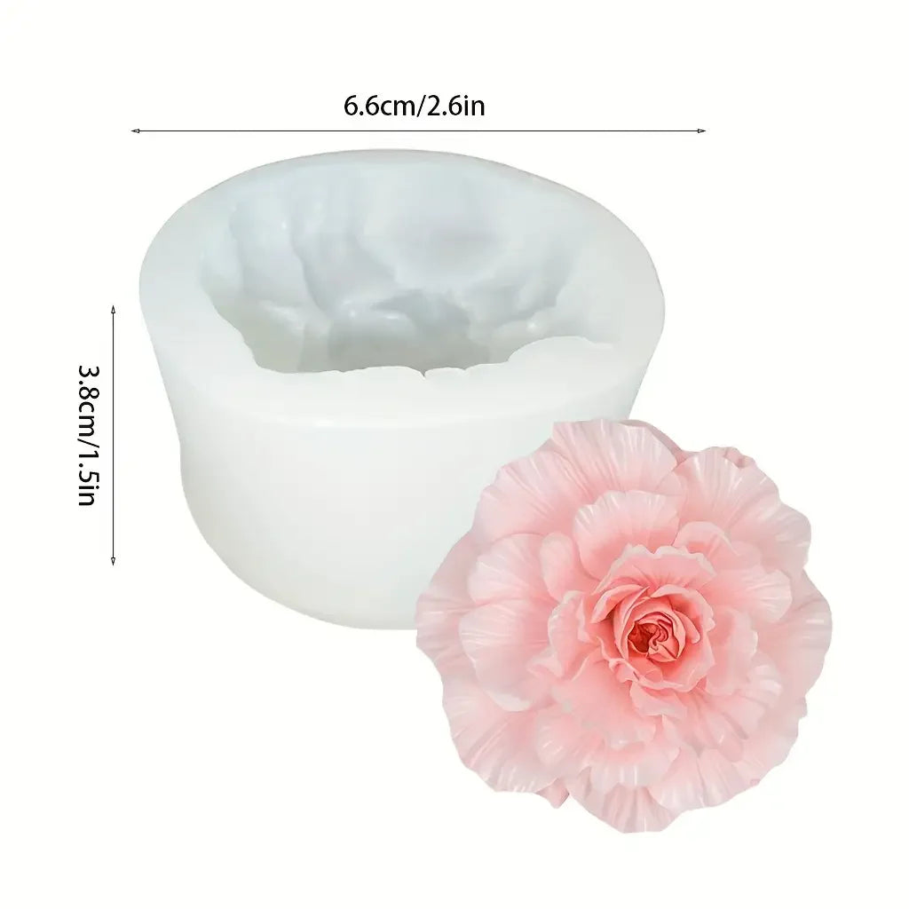 White silicone mold set for making flowers, including a large bloom and smaller petals.
