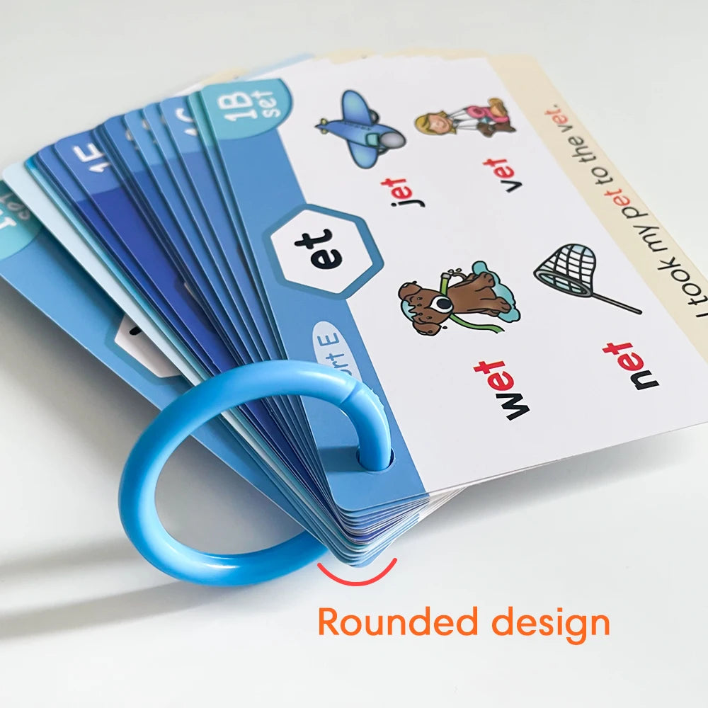 A stack of blue and white phonics learning cards featuring various vocabulary words like jet, vet, and wet.