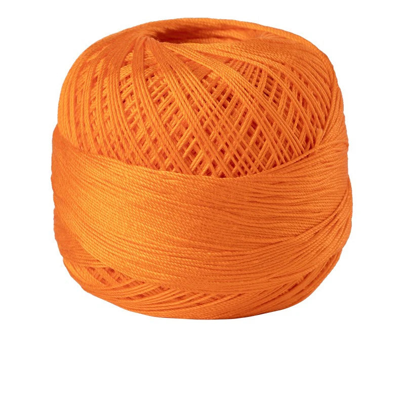 A ball of bright orange 100% cotton crochet thread for tatting and embroidery.