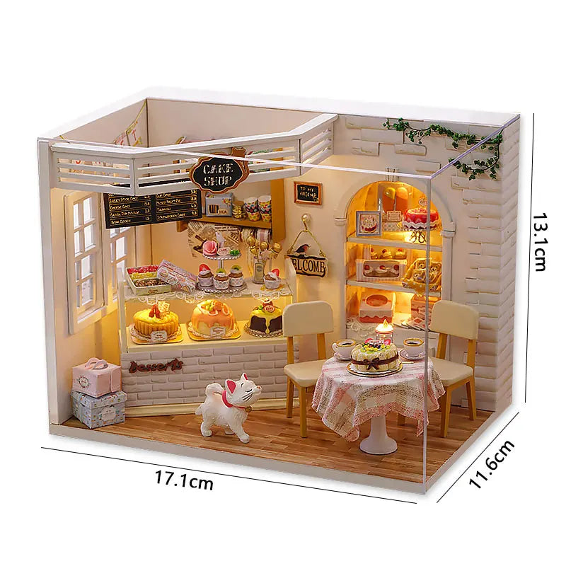 A wooden miniature dollhouse kit featuring a cafe shop interior with furniture and display items.