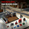 A detailed model of a vintage American garage building blocks set featuring various accessories and structures.