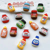 A set of eight kawaii jam jar fridge magnets featuring various fruit and food themes like strawberry, jam, and ketchup.