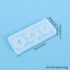 A clear silicone mold with three star-shaped designs for jewelry and craft projects